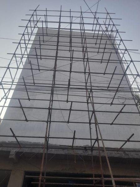 ACP sheet elevation and cladding work on a commercial building facade in Chennai
